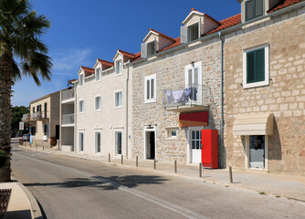 street with traditional houses, Bol, island Brac, Croatia