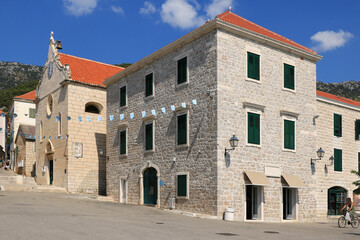 street with traditional houses, Bol, island Brac, Croatia