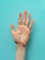 Open hand on blue background