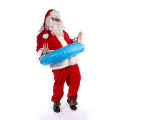 Vacations and holidays. Funny fat Santa Claus with an inflatable ring posing on a white background.