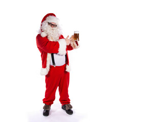 Vacations and holidays. Funny fat Santa Claus drinking beer and posing on a white background.