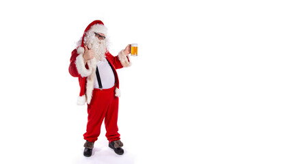 Vacations and holidays. Funny fat Santa Claus drinking beer and posing on a white background.