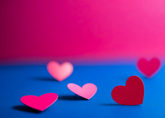 Bokeh pink hearts on blue background. Generative AI
