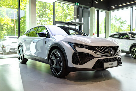 Poland, Jamnica - May 20, 2024: Peugeot 408 plug-in hybrid fastback car. Peugeot 408 is a compact executive sedan French automaker Peugeot.