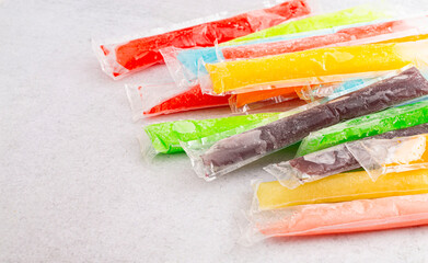 Rainbow Frozen Ice Pop Rainbow Frozen Ice Pop Popsciple on a Kitchen Countertop  on a Kitchen...
