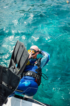Diver goes into the water