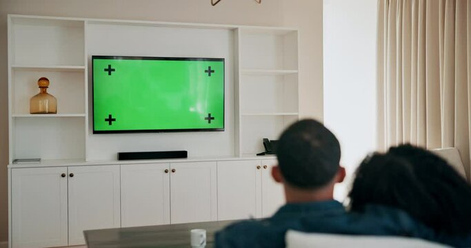 Couple, television and green screen to watch movies in home, subscription and streaming cinema. People, couch date and series for bonding or entertainment, hug and relax together on tracking markers