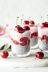 Creamy and delicious cherry chia pudding topped with fresh cherries.