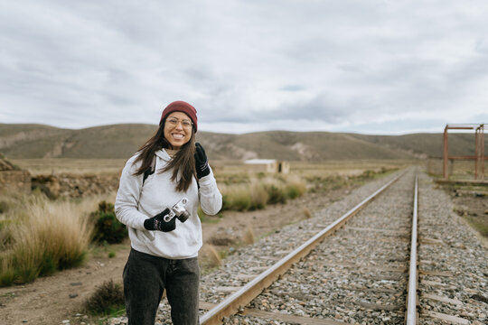 Joyful Photographer with Analog Camera