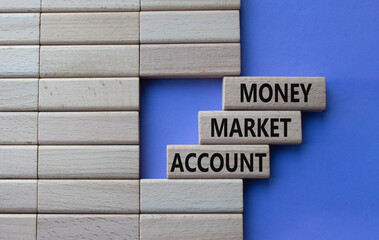 Money Market Account symbol. Wooden blocks with words Money Market Account. Beautiful purple background. Business and Money Market Account concept. Copy space.