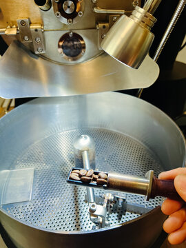 Sampling spoon on coffee roaster