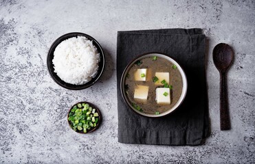 Seaweed soup with tofu and scallions in a bowl