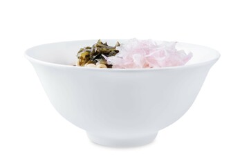 Ramen noodles with seaweed and radish in a bowl on a white isolated background