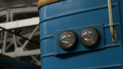 Old retro wagon with round headlights. Depot for old subway trains.