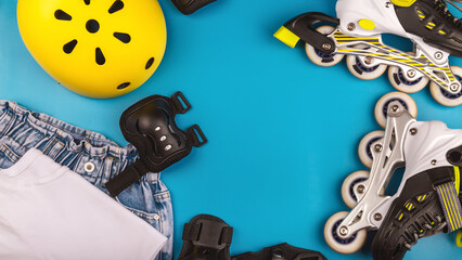 roller skates and body parts protection. top view of inline rollers, helmet, knee pads, wrist...