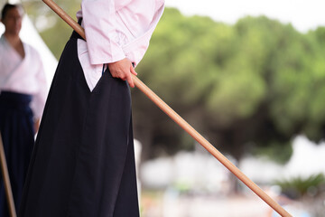 japanese martial arts bojutsu with the help of wooden stick weapons 