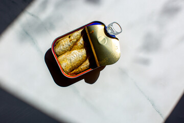 An open can of sardines