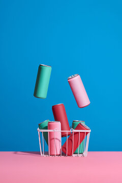 a whole shopping basket with soft drink cans
