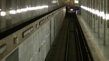Kyiv metro. The subway train arrives at the station.
