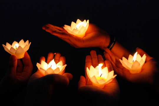 People holding Krathong