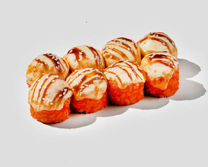 Delicious Japanese sushi rolls with eel and creamy sauce, perfect for celebrating International Sushi Day or Asian culinary delights
