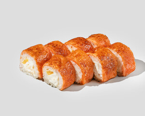 Close-up of freshly prepared sushi rolls with grilled salmon, perfect for Japanese cuisine enthusiasts and fine dining concepts