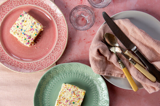 Iced madeira cake with pretty sprinkles.
