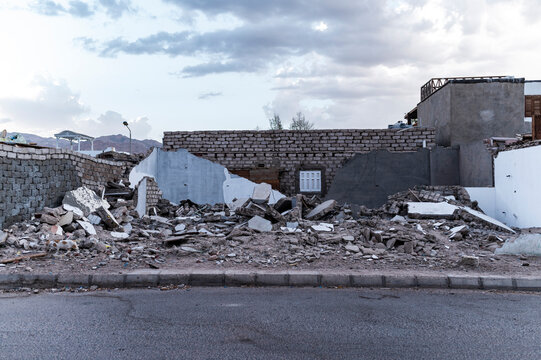 Rubble of a collapsed building in an urban area