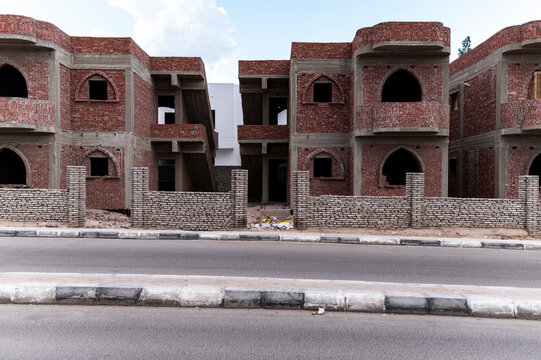 Unfinished brick apartment buildings in Egypt