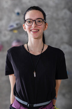 Portrait of a Confident Woman with Glasses and Braces