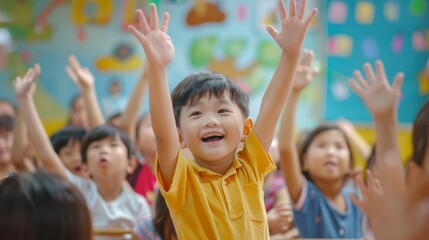 Young children energetically raise their hands in a vibrant classroom filled with colorful decorations, showcasing their enthusiasm for participation and learning in an engaging environment.