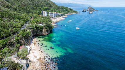 Crystal Clear Water at Paredon Beach, Puerto Vallarta, Mexico. In the Background the National Marine Park