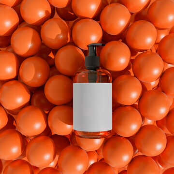 Soap dispenser on orange spheres