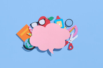 School elements on blue background with space for text