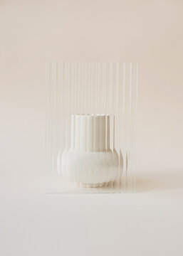 Translucent material with wavy surface blurring object