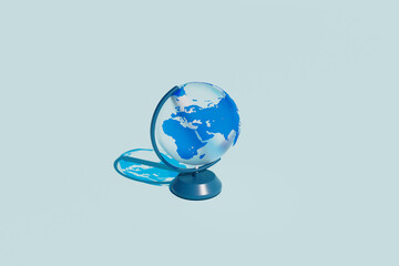 Minimalist Blue Globe on Light Blue Background
