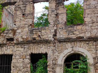 Fragment of a wall of a ruined house in Mostar, Bosnia and Herzegovina