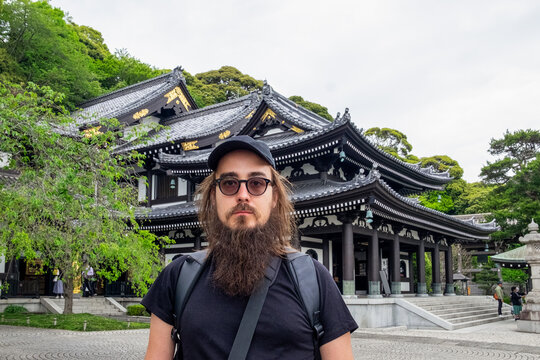 Male tourist on the street in Kamakura, Japan