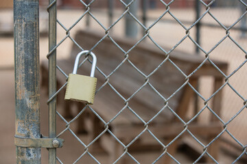 Key Lock on the Fence of a Baseball Dugout