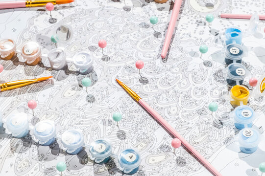 Brushes, colours, and painting scheme.