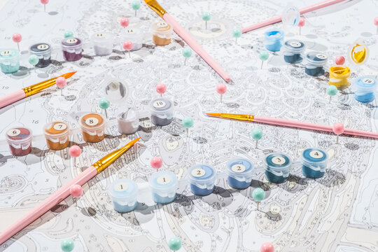 Brushes, colours, and painting scheme.