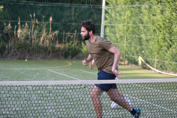Obraz premium Coach And Tennis Student Running Together 