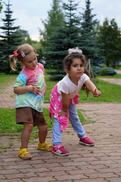 diversive little girls  posing on the street