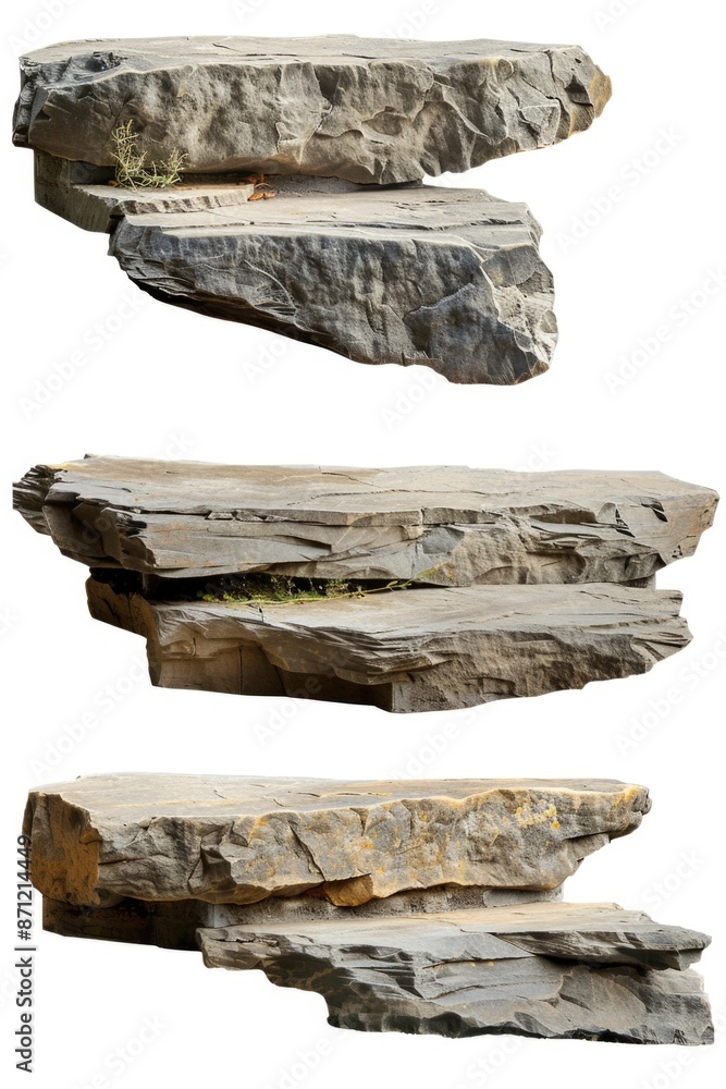 Poster A collection of rocks in various sizes arranged on a clean white surface