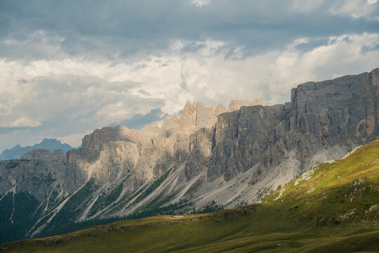 Scenic view of sunny meadow with wildflowers in Dolomites
