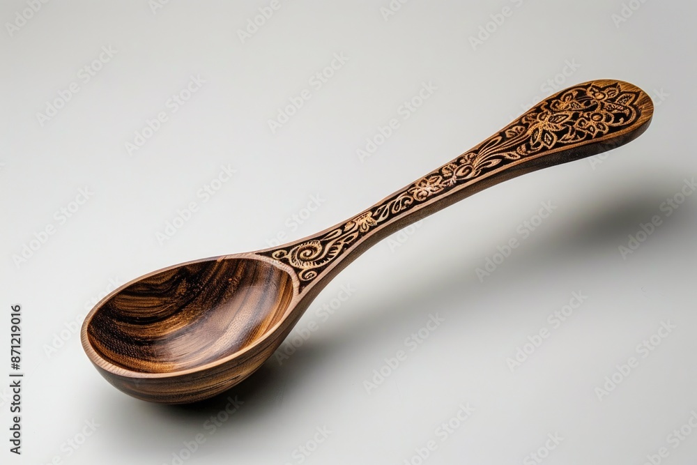 Poster A simple wooden spoon placed on a table with a clean and minimalist background