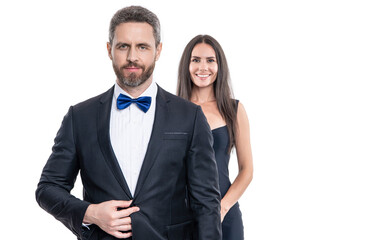 Elegant couple isolated on white. Romantic couple spending time together. Two of man and woman on valentines day. Lovely couple dating. Woman in dress and man in suit with bowtie. Good support