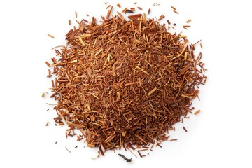 Top view of a pile of rooibos tea on white background