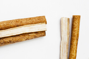 Burdock Root (Gobo) on white background.