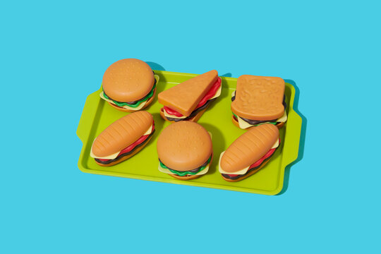 toy burgers and sandwiches on a tray